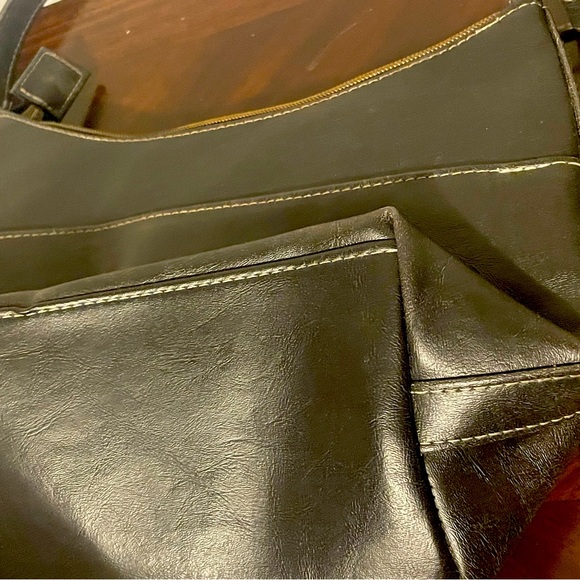 Muda. Black bag, used with signs of use, with 2 bags in front, very practical. - Picture 4 of 5